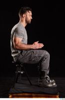  Larry Steel  1 boots dressed grey camo trousers grey t shirt shoes sitting whole body 0013.jpg
